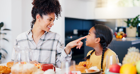 Image showing Smile, breakfast and mother eating with child in dining room at modern home together for bonding. Happy, love and young mom enjoying healthy morning food and juice with girl kid at family house.