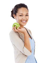 Image showing Portrait, apple and young woman in studio with healthy food choice, Vitamin C and nutrition benefits. Face of person or model with green fruit for detox, self care or vegan diet on a white background