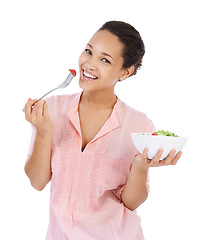 Image showing Diet, salad and woman in portrait eating healthy food, detox lunch or breakfast on a white background. Happy, African person or model with tomato, vegetables and green lettuce or vegan meal in studio