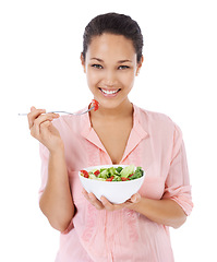 Image showing Diet, salad and happy woman eating healthy food, detox lunch or breakfast on a white background. Portrait of African person or model with green fruits, vegetables and lettuce or vegan meal in studio