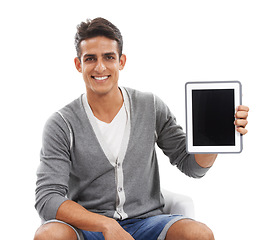 Image showing Portrait, man and mockup screen on tablet in studio for sign up offer, newsletter and information about us on white background. Happy model, digital marketing and advertising space for announcement