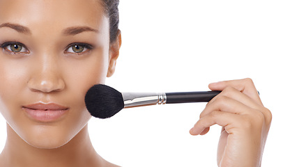 Image showing Makeup, brushes and woman face in studio for beauty, foundation and cosmetics on a white background. Portrait of young model, artist and person with skincare, application tools or dermatology product