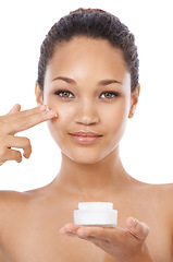 Image showing Young woman, portrait and beauty cream, skincare and cosmetics on a white background. Face of an African model or person with moisturizer application, skin care product and dermatology in studio