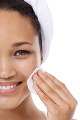 Image showing Woman face, cotton pad and skincare, beauty or cosmetics product for dermatology results in studio. Portrait of African person or model with hygiene wipe for makeup or facial on a white background