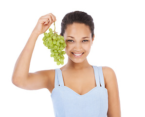 Image showing Smile, portrait or woman with grapes in studio for wellness, nutrition or detox on white background. Face, happy or female nutritionist with fruit for healthy eating, diet or cleanse with sweet snack