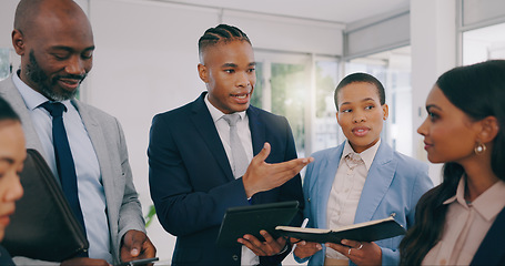 Image showing Business people, tablet and coaching team in meeting for schedule, planning or strategy at office. Businessman talking to employees on technology for project plan, ideas or collaboration at workplace