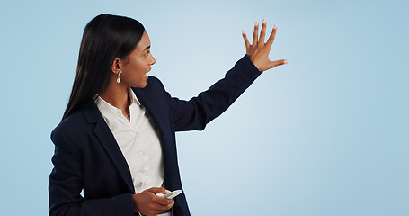 Image showing Business woman, presentation and reporter in advertising against a blue studio background. Female person, employee or journalist speaker showing weather, teaching or information on mockup space