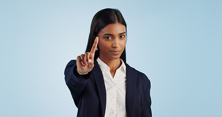 Image showing No, finger and portrait of business woman in studio with limits warning, control or order on blue background. Stop, hands and face of female lawyer with threat, security or compliance fail sign