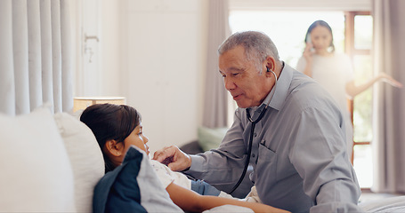 Image showing Senior, man and girl child with stethoscope in bedroom of home for healthcare, wellness and examination. Elderly, doctor and kid for pediatrician, patient and sick on bed in house with consultation