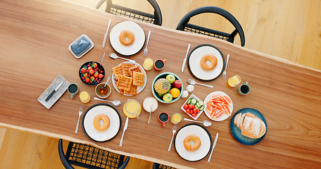 Image showing Healthy, breakfast and food on dining table with top view, fruit and coffee for wellness and nutrition. Morning, brunch and meal with waffles, donut and cutlery for snack or gourmet diet from above