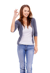 Image showing Ok, sign and portrait of woman in studio for vote, yes feedback and certified news on white background. Happy model with hand emoji for support, agreement and icon of success, review and excellence