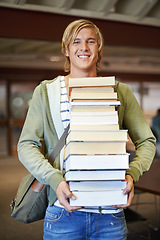 Image showing Pile, books or portrait of happy man in a library for knowledge or development for future growth. Scholarship, education or male student with smile or pride for studying or learning in college campus