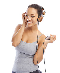 Image showing Happy woman, portrait and headphones listening to podcast for audio streaming against a white studio background. Female person smile enjoying sound track, music or playlist on smartphone with headset