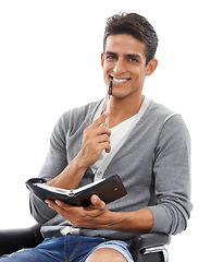 Image showing Businessman, portrait and book or happy in studio for planning, schedule and writing information or research. Person, face or entrepreneur and diary or notebook for administration on white background