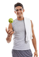 Image showing Man with apple in portrait, health and nutrition in studio with smile, diet and weightloss isolated on white background. Healthy food, green fruit and fitness for wellness and vegan to lose weight
