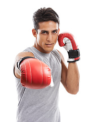 Image showing Boxer, man with punch in portrait and sports for fitness, health and martial arts on white background. Strong athlete with muscle, fight with boxing gloves for MMA training and exercise in studio