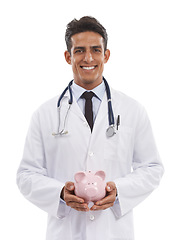 Image showing Doctor, man and piggy bank for savings in portrait, investment and financial loan for healthcare. Male professional, funding and planning hospital budget by white background, studio and security