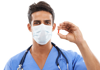 Image showing Nurse, man in portrait in mask and pill for healthcare, pharmaceutical drugs for treatment on white background. Health, wellness and medical professional with tablet, supplement or vitamin in studio