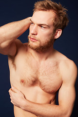 Image showing Man, shirtless with muscle and beauty in studio, pose with confidence and fitness isolated on dark background. Topless, cosmetic care and skin, German model with healthy and strong, muscular body