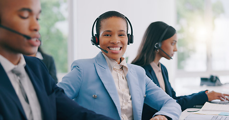 Image showing Happy black woman, portrait and headphones at call center for customer service or support at office. Face of African female person, consultant or agent smile with team for online advice in contact us