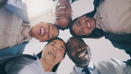 Image showing Business people, face and low angle in circle for team building, meeting or motivation together at office. Group of employees or colleagues smile in diversity for teamwork, unity or community below