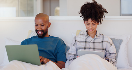 Image showing Home, bed and black couple with a laptop, technology and smile with love, internet and streaming a movie. Bedroom, apartment or man with woman, connection or film with bonding, happy and marriage