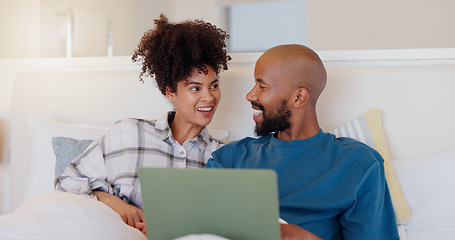 Image showing Home, bed and black couple with a laptop, love or smile with website for comedy, internet or streaming a movie. Bedroom, apartment or man with woman, connection or film with romance, happy or bonding