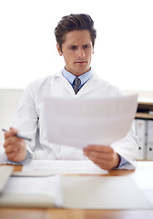 Image showing Reading, document and portrait of man doctor in the office for consultation in a medical hospital. Serious, report and professional young male healthcare worker with paperwork for research in clinic.