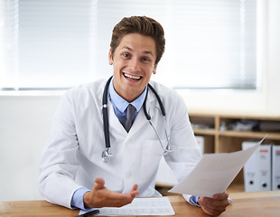 Image showing Smile, document and portrait of man doctor in the office for consultation in a medical hospital. Happy, reading and professional young male healthcare worker with paperwork for research in a clinic.