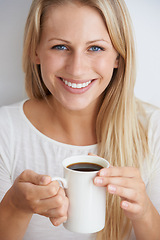 Image showing Woman, portrait and happy in studio with coffee for morning caffeine, break and energy for relax and drink. Person, face and smile with beverage, cup and cheerful with closeup on white background