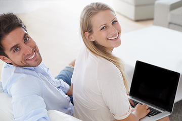 Image showing Portrait of happy couple, laptop or mockup for home planning, research or typing online. Information, back and people screen for advertising space or marketing for website sign up or registration