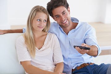 Image showing Relax, relax or happy couple watching tv or movie on online subscription or enjoying fun videos or news. Smile, love or woman streaming a film with a romantic man at home on sofa or couch in lounge