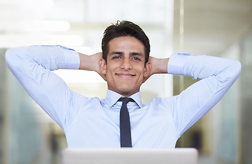 Image showing Businessman, happy and thinking in office by laptop, smiling and contemplating proposal or review. Male professional, technology and internet connection for online research, confidence and pride