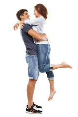 Image showing Happy couple, hug and lifting for love, care or support in relationship on a white studio background. Man and woman smile in joy for embrace, marriage or affection together in trust on mockup space