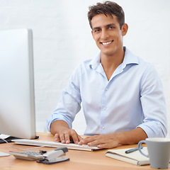 Image showing Happy man, typing or portrait with computer at office with pride for career ambition or opportunity. IT support, business or male employee programming with research online at workplace or desk on pc