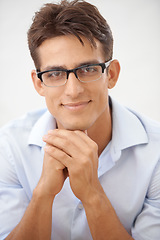 Image showing Man, face and glasses for vision with smile, eye care or optometry with professional style on white background. Smart, confident in portrait with fashion frame and prescription lens in studio