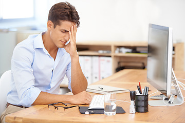 Image showing Businessman, headache and stress on computer in mistake, burnout or fatigue at the office. Frustrated man or employee with migraine in anxiety, mental health or work pressure by PC desk at workplace