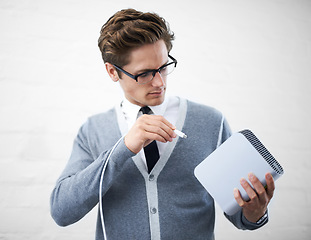 Image showing Man, job and hard drives for storage space, geek and cables for computer, working and young. Technician, excited and laughing with corporate clothes, fashionable and glasses for technology computing