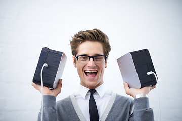 Image showing Man, happy and hard drives for storage space, geek and cables for computer, face and young. Technician, excited and laughing with corporate clothes, fashionable and glasses for technology computing