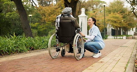 Image showing Nurse, relax and park with old woman in a wheelchair for retirement, elderly care and physical therapy. Trust, medical and healthcare with senior patient and caregiver in nature for rehabilitation