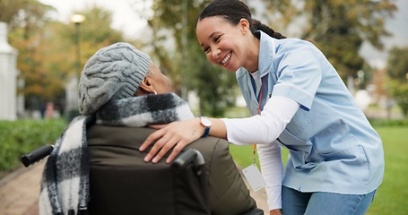 Image showing Nurse, happy and park with old woman in a wheelchair for retirement, elderly care and physical therapy. Trust, medical and healthcare with senior patient and caregiver in nature for rehabilitation