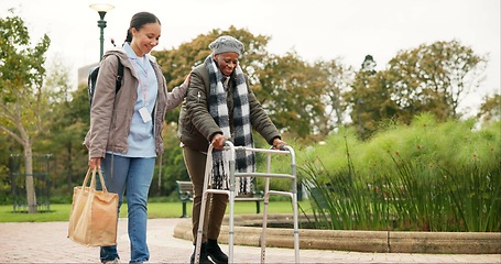 Image showing Nurse, support and walker with old woman in park for helping, person with a disability and retirement. Elderly care, nursing and rehabilitation with caregiver and patient in nature for healthcare