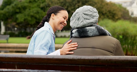 Image showing Nurse, happy and support with old woman on park bench for retirement, elderly care and conversation. Trust, medical and healthcare with senior patient and caregiver in nature for rehabilitation