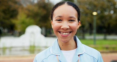 Image showing Professional nurse woman, outdoor and face with smile, young and excited for medical career in Toronto. Doctor lady, park and nature for walk, wellness and healthcare in summer sunshine in portrait