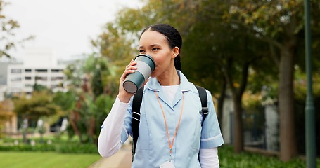 Image showing Medical nurse, woman, coffee and outdoor with thinking, vision or ideas for healthcare career in Toronto. Young doctor, park and nature for walk, drink tea and mindset on path, wellness or clinic job