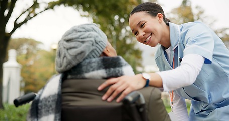 Image showing Nurse, support and park with old woman in a wheelchair for retirement, elderly care and physical therapy. Trust, medical and healthcare with senior patient and caregiver in nature for rehabilitation