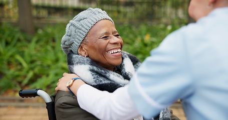 Image showing Nurse, smile and park with old woman in a wheelchair for retirement, elderly care and physical therapy. Trust, medical and healthcare with african patient and caregiver in nature for rehabilitation