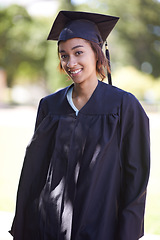 Image showing Happy woman, portrait and outdoor graduation for qualification, learning or career ambition in education. Female person, student or graduate smile for higher certificate, diploma or degree in nature