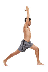 Image showing Man, meditation and yoga in studio for exercise or spiritual awareness, zen and warrior pose. Male person, pilates and peace or wellness and balance or fitness, active and cardio by white background