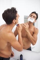 Image showing Man, shaving cream and blade in mirror for hair removal in bathroom, beauty and wellness. Male person, skincare and cosmetics or cleaning in morning routine, grooming and razor in reflection at home